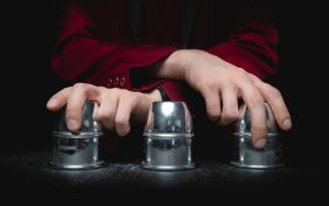 Winning Strategies for the Thimbles Game